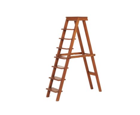 AN INDONESIAN LIBRARY LADDER
Foldable
166cm high x 127cm fully open x 46cm deep
Condition: Minor signs of wear commensurate w