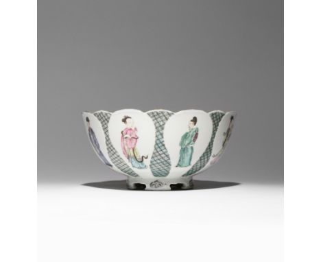 A CHINESE FAMILLE ROSE MOULDED BOWL YONGZHENG 1723-35 The U-shaped body moulded as a flowerhead, painted with petal-shaped pa
