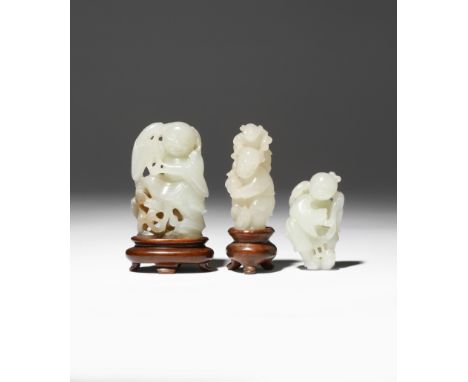TWO CHINESE JADE CARVINGS OF LIU HAI AND A CARVING OF A BOY 18TH/19TH CENTURY The pale celadon carving of Liu Hai worked with