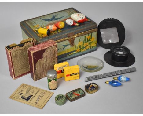 A Vintage Blue Bird Toffee Tin Containing Various Sundries to Include Magic Lantern Lens, Graphophone Needle Cases, Car Badge