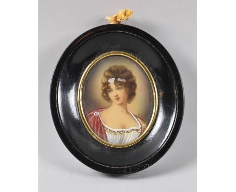 A Framed Continental Oval Portrait Miniature of a Maiden, 13cm high 