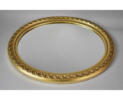 A Gilt Framed Oval Wall Mirror, 58x48cm Overall 