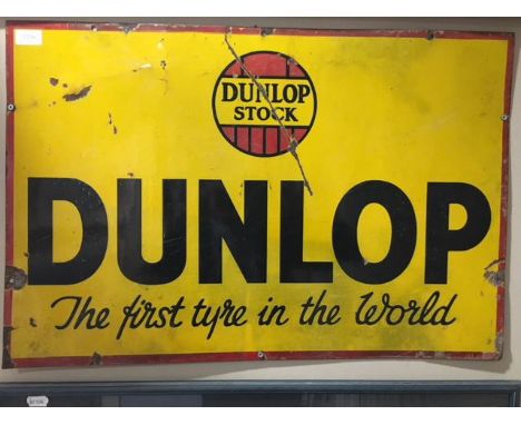 A Dunlop Single Sided Enamel Advertising Sign, Dunlop stock the first tyre in the world, assorted drill holes, 51cm by 76cm