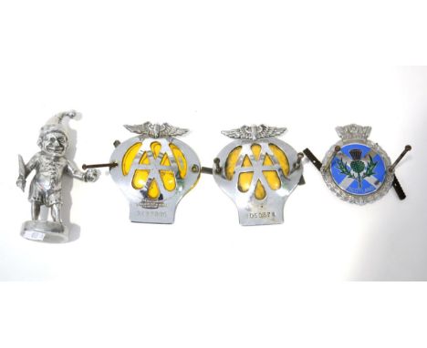 A Nickel Plated Car Mascot in the form of Mr Punch, 15cm high; two chrome plated AA badges, numbered 3A27960 and 1D50574; and
