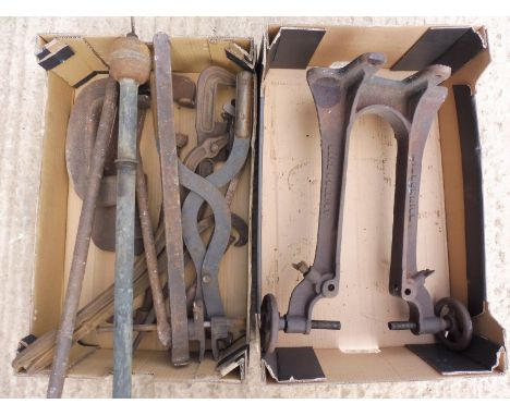 A collection of early workshop tools including Link and Elliott, early tyre spreading tools, levers etc.