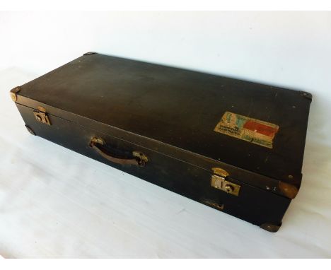 A rectangular travelling trunk with Imperial Airways travelling label, probably pre-war, 34 1/4" wide x 7" high x 15" deep. 