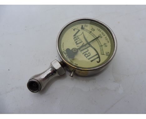 A Vauxhall P&amp;G tyre pressure gauge. 