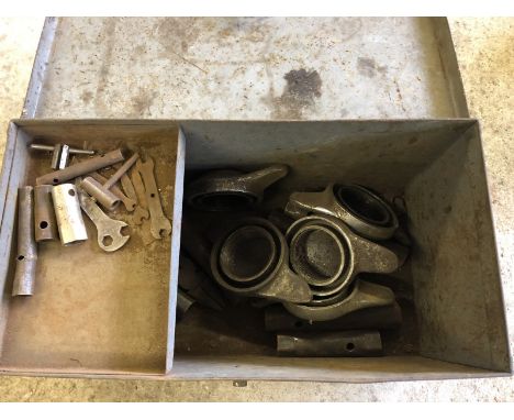 Five wheel spinners in a metal tool box with assorted box spanners etc.