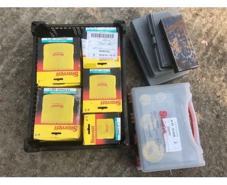 A quantity of Starrett hole saws, and other boxed tools.