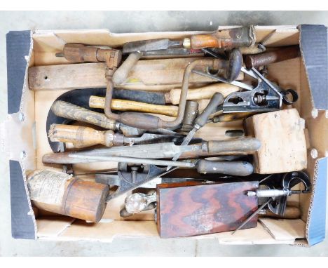 A box of assorted workshop tools. 