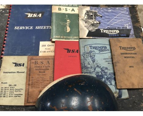 A selection of BSA motorcycle literature to include an instruction book for the 1937 models, a selection of Triumph literatur