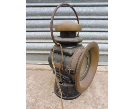 A Lucas King of The Road no. 653 black enamel and polished brass paraffin lamp, electrified.