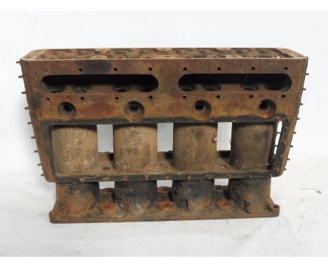 A Bentley WO three litre engine block, used and rusty.