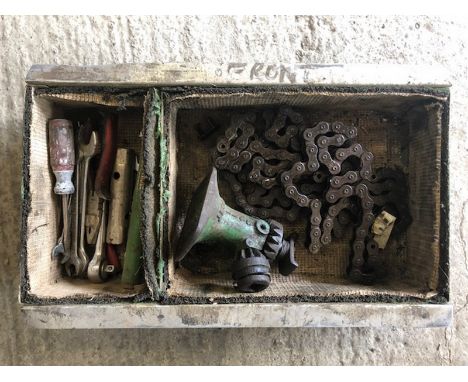 An ex-Nash tool tray, with tools inside.