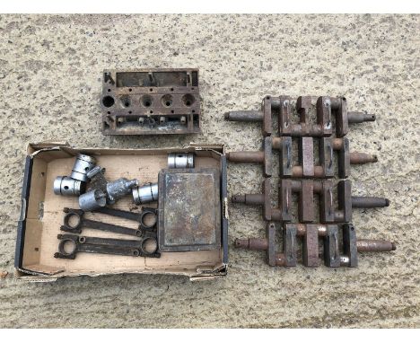 A quantity of Riley 9 engine parts comprising four crankshafts, a set of conrods, a set of pistons, an SU carburettor, a tin 