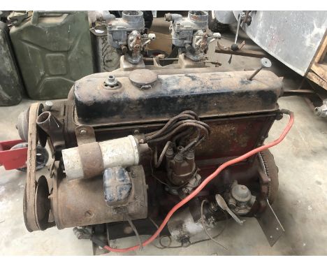 An EMW six cylinder engine with twin Solex carburettors.