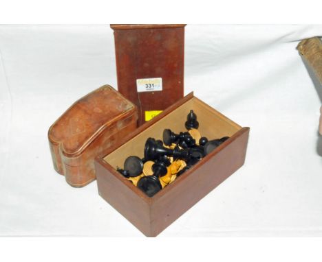 Leather playing card case and a boxed set of chess pieces