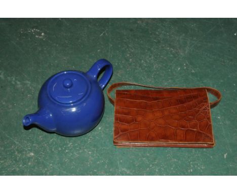 Blue teapot and handbag