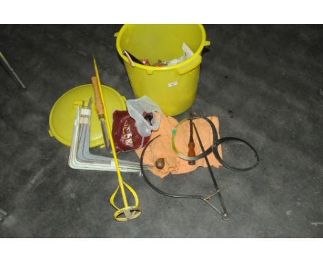 A yellow bin of hand tools