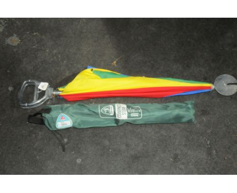 Combined shooting stick umbrella and a folding camping stool 