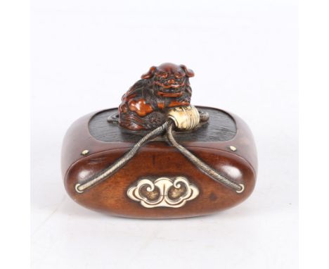 of oval section, mounted with trompe l'oeil carved boxwood lion netsuke carved ivory ojime and trailing cords, drawer front i