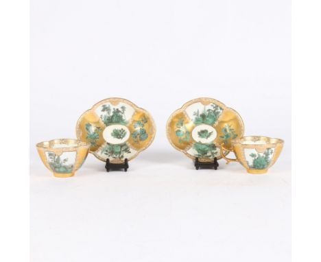 of lobed quatrefoil form, each reserved with two panels painted in shades of green and black with Watteauesque scenes depicti