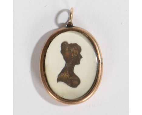 Portrait of a Lady in Profile signed, bronzed miniature silhouette 3 x 2cm, glazed front and back.