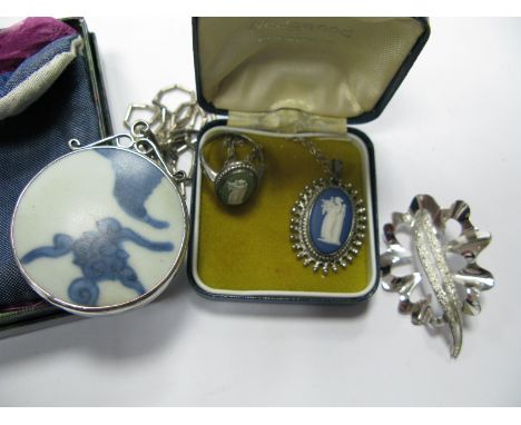 A Ceramic Panel Circular Pendant, Wedgwood Jasperware pendant and dress ring, etc