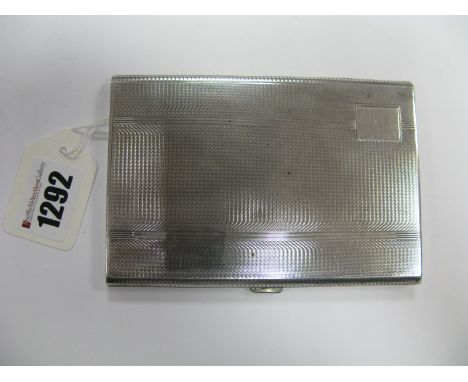 A Hallmarked Silver Cigarette Case, allover engine turned.