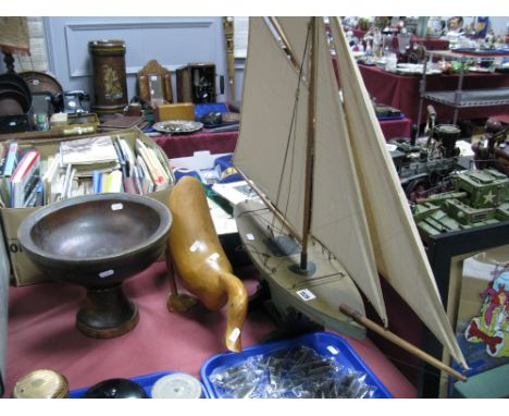 A Four Sail Model Boat on Stand; together with a wooden bowl and wooden duck. (3)