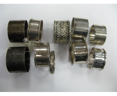 Hallmarked Silver and Other Napkin Rings, including engine turned, initialled, etc.