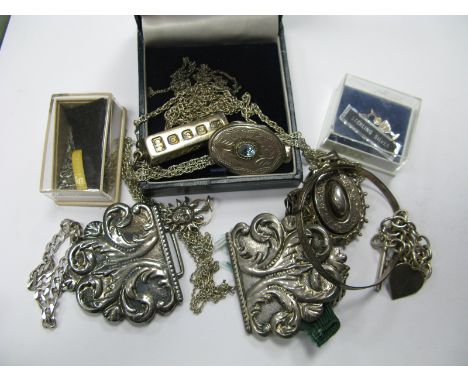 A Victorian Style Oval Locket Pendant, a patterned expanding bangle, a gate style bracelet with heart shaped clasp, ingot, et
