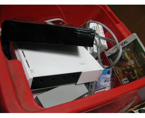 Three Ninetendo Wii Gaming Consoles, two white, one black, plus eight Nintendo DS hand held console games.