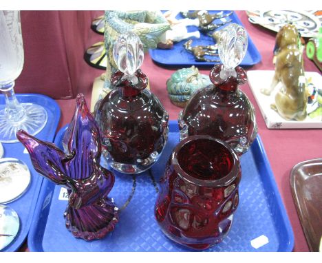 A Pair of Aseda Glasbruk Swedish Purple Glass decanters with clear glass stoppers, 23cm high, a Whitefriars knobbly ruby glas