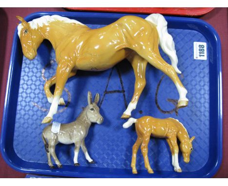 Beswick Palomino Arab Type Horse and Foal, plus a donkey. (3)