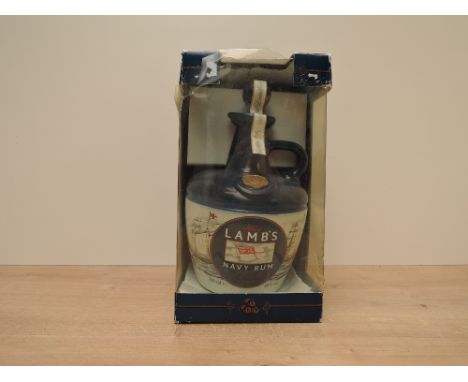 A ceramic Decanter containing Lamb's Navy Rum, 40% vol, 750ml, in display box