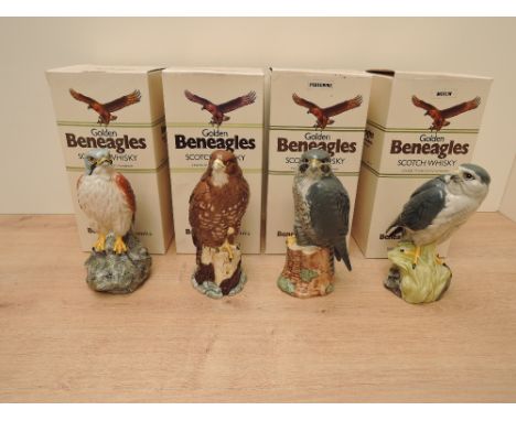 A set of Four Beswick/Royal Doulton Golden Beneagles Scotch Blended Whisky Decanters, all sealed and appear to have contents,