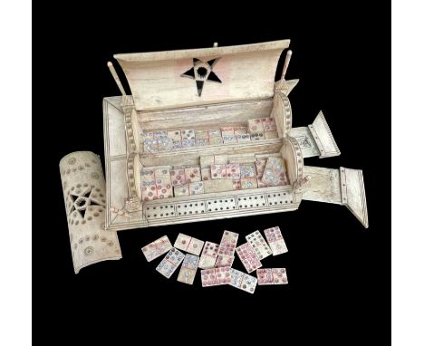 NAPOLEONIC PRISONER-OF-WAR BONE GAMES BOX, early 19th Century, the double container with dominoes to double-9, star-pierced d