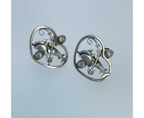 PAIR OF GEORG JENSEN SILVER EARRINGS, modelled as a pair of dolphins within a heart shaped border, No 101, designed by Arno M