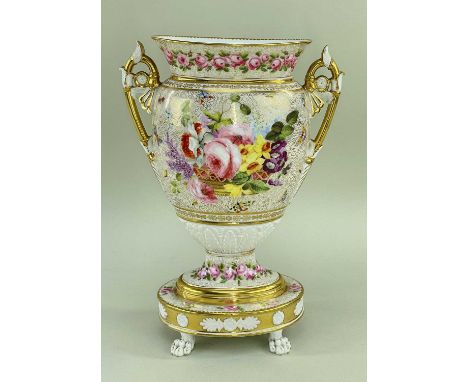 AN IMPRESSIVE CONTINENTAL TWIN-HANDLED VASE believed French, circa 1820-1830, oval campana shaped on four paw feet and flared