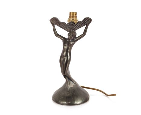 A Spelter Art Deco table lamp, in the form of a naked lady holding stylised shade holder aloft (no shade), 26cm high 