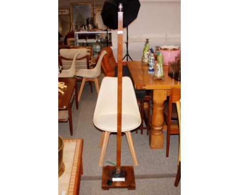 An Art Deco chrome and walnut veneer standard lamp, with shade