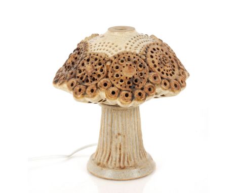 A Bernard Rooke table lamp, having pierced mushroom shaped shade, 27cm high