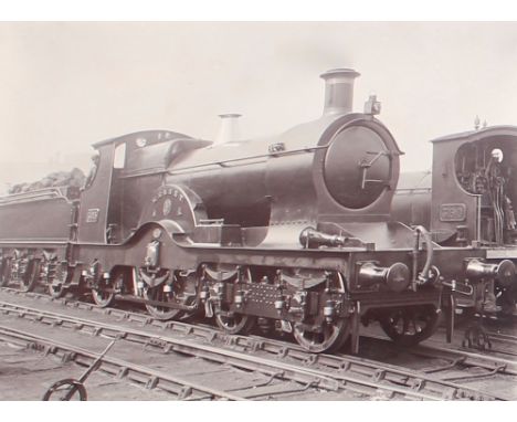 A photograph album containing 36 vintage photographs of trains