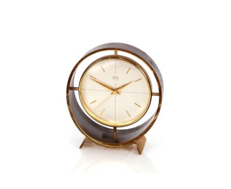 A Gruen of Geneva brass and enamel decorated mantel clock, of circular form, 13cm 