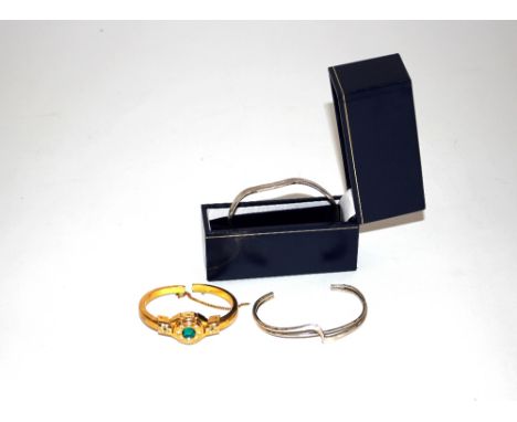 A .925 marked bangle; another similar and a yellow metal ladies bracelet watch