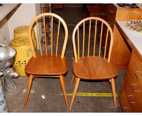 A set of four Ercol stick back dining chairs and another similar, AF