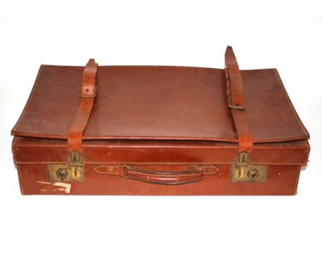 A vintage leather suitcase; a calf skin wallet; and another 
