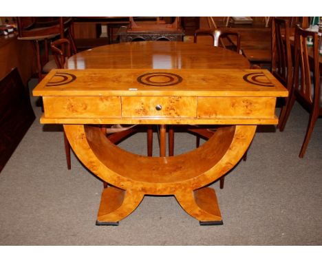 An Art Deco style console table fitted with a single drawer, and raised on "U" shaped supports and plinth.&nbsp;&nbsp;The dim