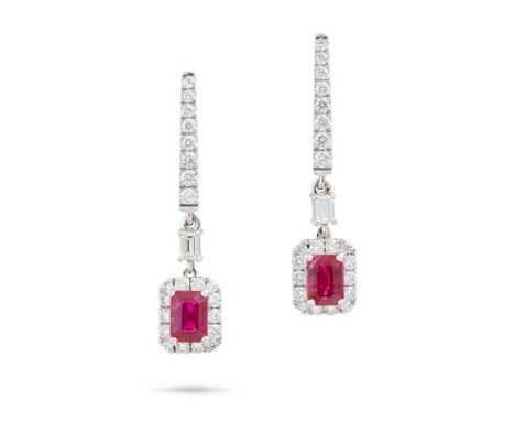 A PAIR OF BURMESE RUBY AND DIAMOND DROP EARRINGS each comprising a row of round brilliant and baguette cut diamonds, suspendi